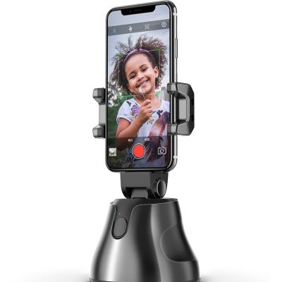 China Wholesale Smart Shooting 360 Tracking Object Stand New Selfie Stick Stand 360 Tracking Object Stand Cell Phone Holders Auto Face Trending for sale