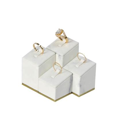 China Marble Luxury Style Metal Stand Holder Clip Ring Display Metal Jewelry PU Leather Jewelry Counter for sale