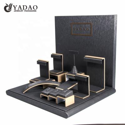 China Luxury Leather Jewelry Display Velvet Metal Wood Jewelry Packaging Display Necklace Trays Stand Rack Set Display Cabinet for sale