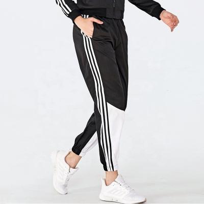 China High Quality Breathable New Style Track Stripped Pants For Women Casual Gaiters With Pockets Gym Wear Manufacturer for sale