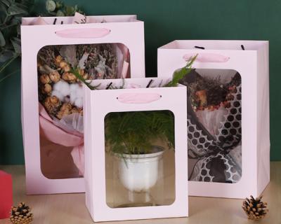 China Recycled Materials Valentine's Day Birthday Gift Paper Bag With Handle Open Window High Quality Transparent Flower Gift Paper Bag for sale