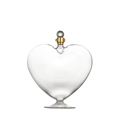 China Household products art white wine bottle heart-shaped empty creative transparent lead-free bottle for sale