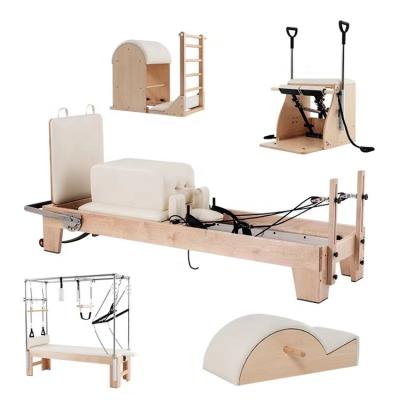 China Hot Sale Eco-friendly Fitness Exercise Pilates Chair Reformaer Cadillac Equipment Gymnasium Pilates Machine Five Pieces for sale