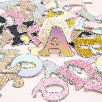 China Handmade Wholesale Glitter Running Iron On Crystal Letter Alphabet Applique Patches Rhinestone for sale