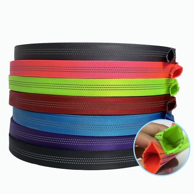 China 1 Inch Elastic Durable Reflective Tubular Nylon Webbing For Bag Belt Reycled Polyester 25mm Nylon Tubular Hollow Webbing for sale