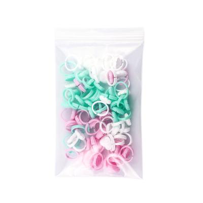 China 100 PCS Glue Quick Bloom / Dip Lash Glue Ring Cups Heart Shaped Volume Whips Quick Bloom Cups For Lash Extensions for sale