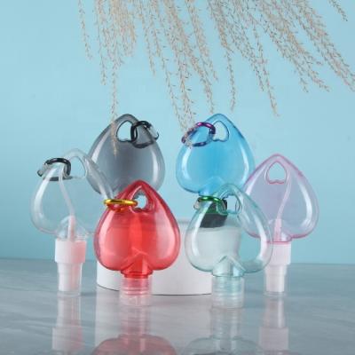 China Wholesale Heart-Shaped Agriculture Plant Spray Bottle 50ML Travel Gel Bottle Portable Carabiner Hook Bottle for sale