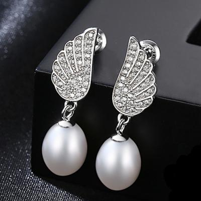 China FASHIONABLE OUXI Angel Wing Stud Earrings Beauty Women Gift Jewelry Manufacturer Y21458 Freshwater Pearl 925 Sterling Silver for sale