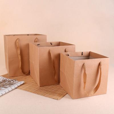 China Recyclable luxury boutique can print logo multicolor kraft paper bag for pastries takeout bag with ribbon handle for sale