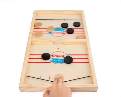 China Wooden Slingshot Quick Table Rebounding Hockey Party Winner Board Game Wooden Hockey Match for sale