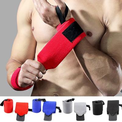 China Fit Protective Gear Fitness Cross Safety Wrist Wraps Custom Logo Adjustable Wrist Support Weightlifting Wristband Strap Brace With Thumb Loop for sale