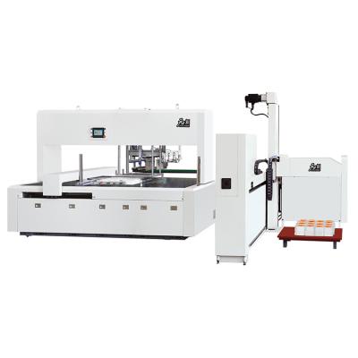 China Automatic Factory Label Stripping Machine Automatic Cutting Machine With Mechanical Arm for sale