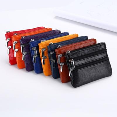 China Real Leather Mini Zipper Coin Purse Wallet Women's Fashion Two Change Durable Pocket Zipper With Key Chain for sale