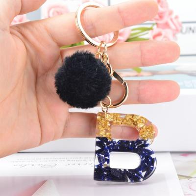 China New 26 Resin Key Chains Letters Charms Keychain Chains With Black Fashionable Key Bag Keychains Ball Fur Pendant Accessories Holder for sale