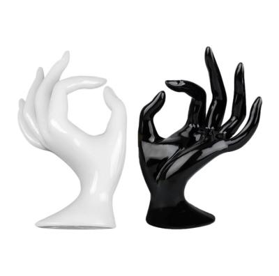 China Fashionable Black /White Fashion Plastic Jewelry Display Hand Model Bracelet Ring Necklace Display Stand Holder For Window Display for sale