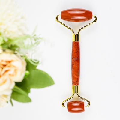 China Whitening Crystal Jade Facial Roller Crystal Rodillo natural Jade Red Jasper Jade Roller for anti aging for sale