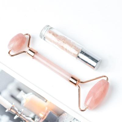 China Newest Anti-puffiness Natural Facial Roller Massager Rose Quartz Jade Roller With Rose Essential Oil Bottle for sale