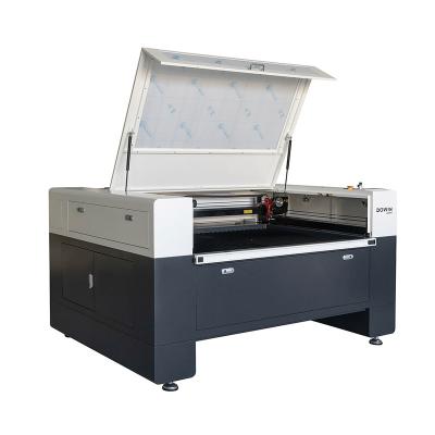 China Hot Sale 100w 130w 150w High Speed ​​CO2 Laser MDF Wood Laser Cutting Machine 1390 CNC For Sign for sale