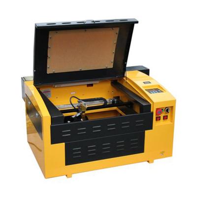 China Laser Engraving Mini Laser Engraving Machine 3040 High Quality Very Easy To Take Desktop Design Laser Portable for sale