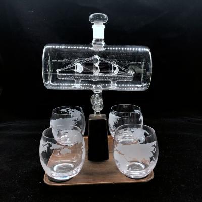 China Wine Wine Navigation Clear Built-in Wine Barrel Shaped Glass Bottle With 4 Glasses And Wooden Base for sale