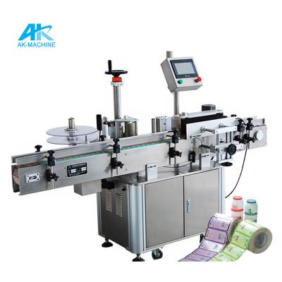 China AK-SL100 Beverage Adhesive Sticker Labeling Machine / PET Bottle Labeling Equipment for sale