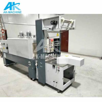 China The Beverage Shrink Wrap Machine Plastic Bottle The Shrink Paper Packaging Machinery PE Shrink Film Packaging Machine for sale