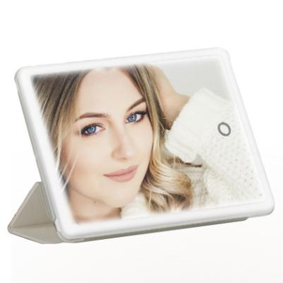 China Travel Lighted Makeup Mirror Foldable Vanity Mirror Portable Lightup Mirror With Auto Sleep Function for sale