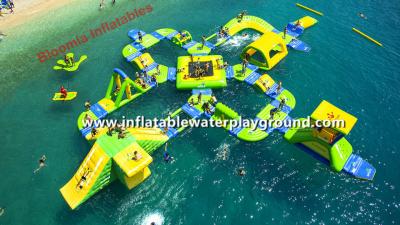 China Resort Floating Inflatable Amusement Park 0.9mm PVC Tarpaulin For 65 People for sale