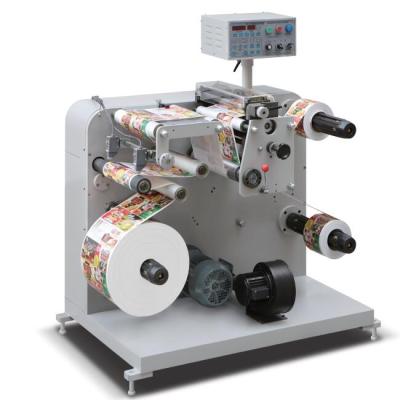 China DK-320 Label Slitting And Rewinding Machine With Hole Cutting Punching Machine for sale