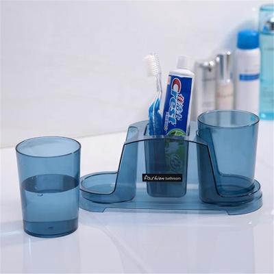 China Fashion Style Stocked Bathroom Sets Plastic Toothbrush Holder With 2 Cups for sale