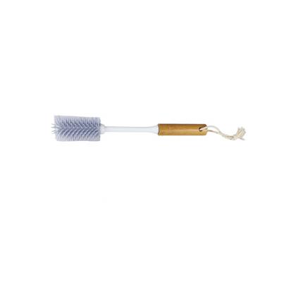 China Viable bamboo bottle brush with soft TPR silicone bristle for sale