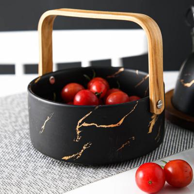 China Sustainable Luxury Large Rice Soup Fruit Wedding Restaurant New Arrival Porcelain Black Marble Bowl Set With Wooden Handle for sale