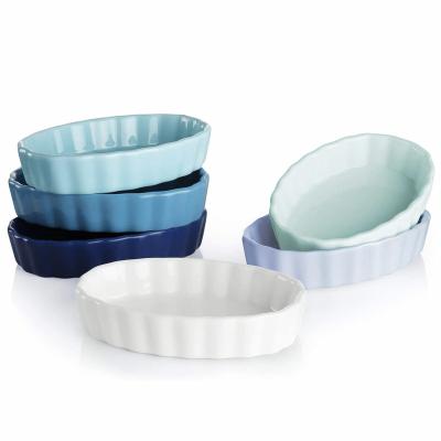 China Factory Direct Sale Custom Wholesale Stripe Pudding Viable Colored Oval Cream Cake Ceramic Ramekin for sale