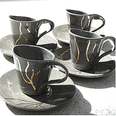 China Viable Unique Custom Matte Black Factory Price Irregular Luxury Ceramic Black Tea Mug for sale