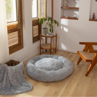 China Cozy Soothing Round Dog Cuddler Worry Donut Dog Beds Navy Dog Beds Viable Warm Cushion Cat Bed for sale