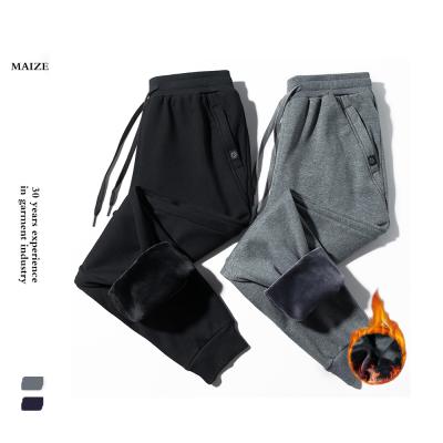 China 2022 New Winter Anti-wrinkle Hot Selling Jogging Clothes Warm Wool Lined Loose Pants Thickened Winter Sports Men Pants Elastic Waist Pocke for sale