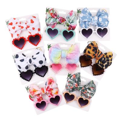 China 2022 fashion sunglasses cute baby heart shape sunglasses and printing big bow baby headband set for kids gift for sale