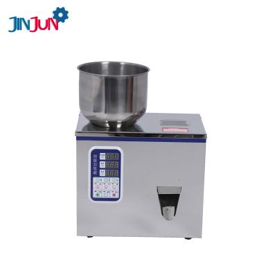 China Beverage JINJUN 1-99G, Desktop 1-200G Semi-automatic Granular Tea Nut Sugar Seasoning Powder Surge Filling Machine for sale