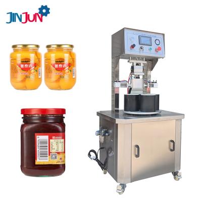 China Food JINJUN 4-Heads Semi-automatic Pneumatic Vacuum Lid Vacuum Screw Capping Machine For Jar Glass Bottles for sale