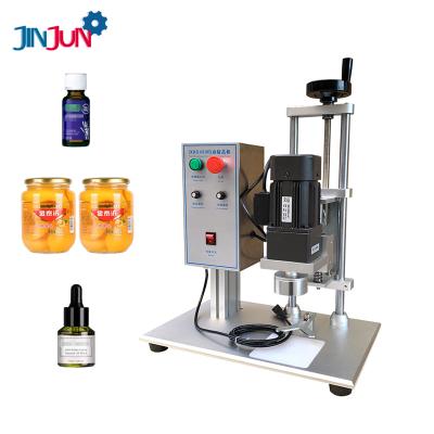 China Food JINJUN 450 desktop water bottle capping machine screw semi-automatic plastic glass jar cap capping machine for sale