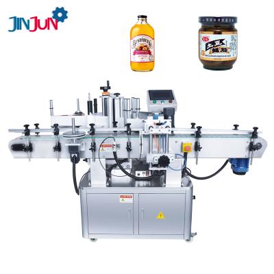 China Food JINJUN Automatic Self Adhesive Double Side Sticker Labeling Machine For Glass Bottle Plastic Bottle for sale