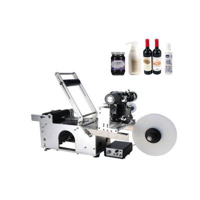 China JINJUN-50 food cans automatic wine bottle small round bottle plastic labeling machine for sale for sale