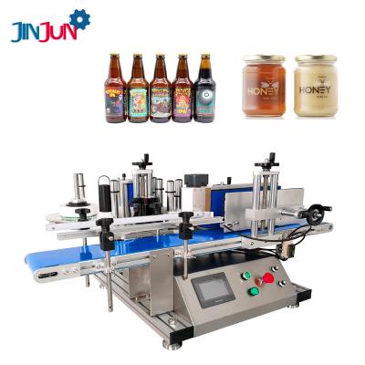 China Desktop Food JINJUN Automatic Glass Can Plastic Round Bottle Labeling Machine for sale