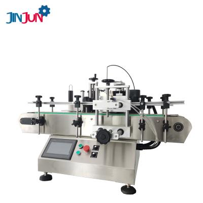 China JINJUN Food desktop automatic double side water bottle round bottle plastic labeling machine with date printer for sale