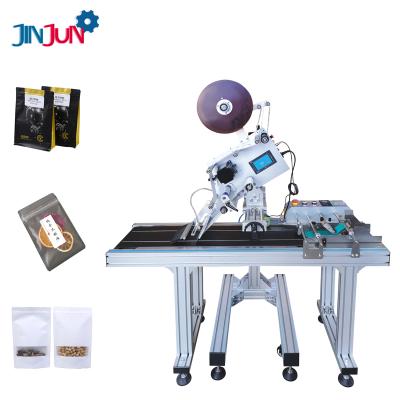 China JINJUN automatic food flat surface paper bag, plastic bag labeling machine paging labeling machine on hot sale for sale