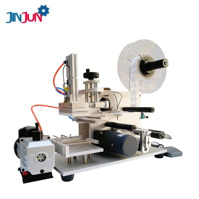 China JINJUN Desktop Food Semi-automatic Flat Labeling Machine Cosmetic Box Carton Flat Labeling Machine for sale