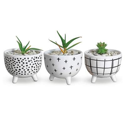 China 100% handmade nordic porcelain flower pot ceramic planters with feet for home decoration for sale