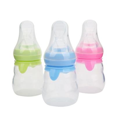 China New Arrival Creative Squeeze Spoon Unbreakable Food Dispenser Feeder Baby Silicone Feeding Bottle with Spoon for sale