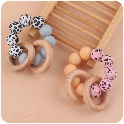 China BPA Free Silicone Beach Ring Baby Toy Teether Wholesale Wooden Baby Silicone Teethers for sale