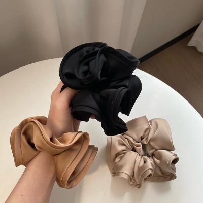 China Fashion French Style Designer Solid Color Scrunchies Elegant Big Flower Elastic Hair Bands For Women for sale